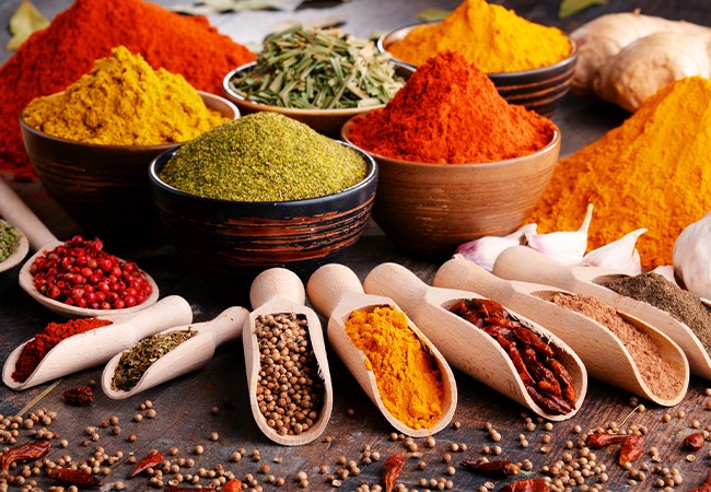 Assorted Indian spices — colourful powders and whole spices